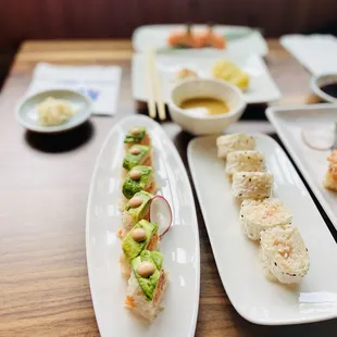 Spicy tuna wrapped avocado roll,  baked crab roll.