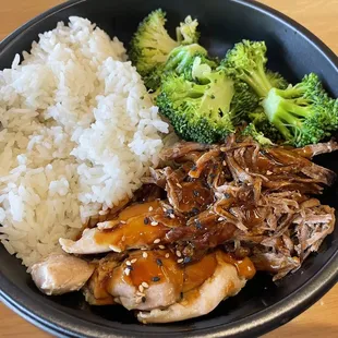 a bowl of rice, meat, and broccoli