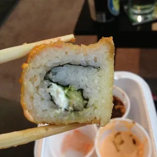 My Alan Special roll. As you can see it is ALL rice!!!! Not cool, man.