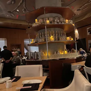 a restaurant with people sitting at tables