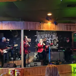 a band performing on stage