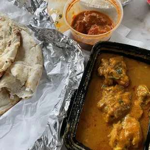 a chicken curry and naan bread