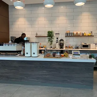 a counter with a coffee maker