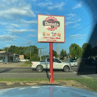 a sign for a donut shop