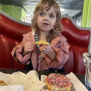 Donuts and croissant sandwich with drink