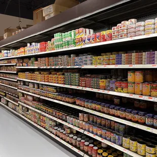 shelves of canned food in a grocery store