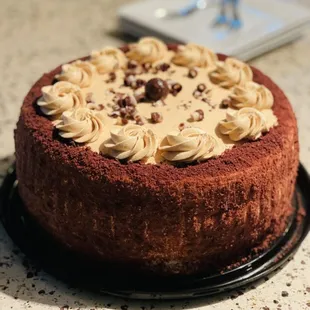 a chocolate cake with peanut butter frosting