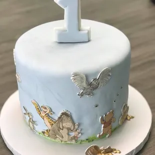 a cake with a number one on it