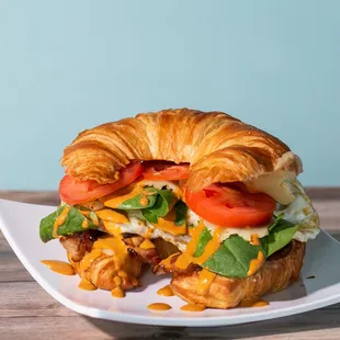 a croissant sandwich on a plate