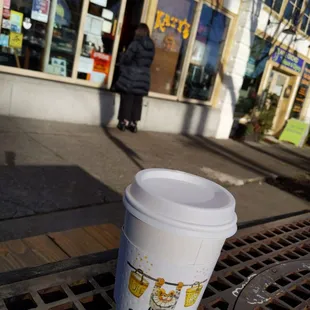 a cup of coffee on a table