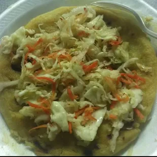 Cheese pupusa with curtido.