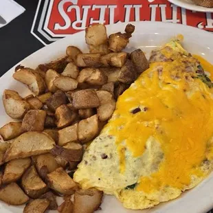 Custom omelette with potatoes. The potatoes were dry and flavorless.