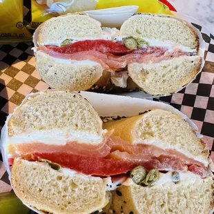 two sandwiches on a checkered table