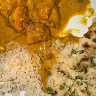 Butter chicken, rice and garlic naan.