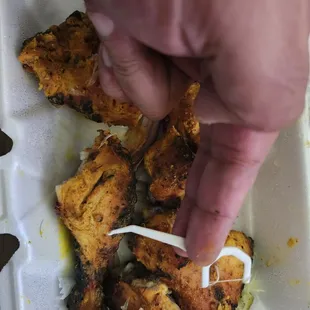 Look at the color of the chicken, nothing like the picture they show as their chicken tandoori.