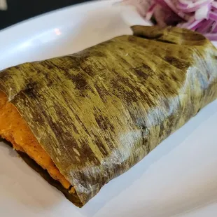 The tamales are steamed in banana leaves, leaving them so moist and delectable.