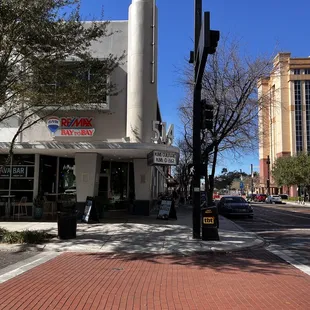 corner lava bar with outdoor seating and parking across the street