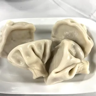 Georgian soup dumplings. 4 to an order. Meat and juice filled.