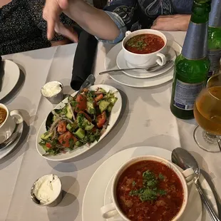 a table full of food and drinks