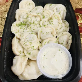 Chuchvara 18pc

&quot;Delight in the exquisite flavors of handmade small boiled dumplings filled with savory ground beef and chopp