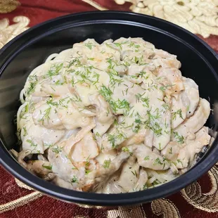 Creamy chicken and mushroom pasta

&quot;Savor the rich and comforting flavors of our fettuccine pasta with chicken and mushrooms,