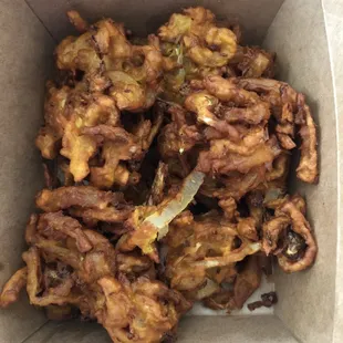 Mixed Vegetable Pakora.  Gluten free.  As expected no crispy anymore after delivery, easily fixed with oven or airfryer!
