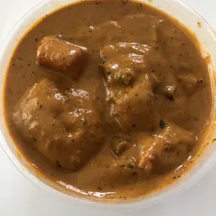 Vegetable Tikka Masala.  Potatoes, Cauliflower, Chopped green beans, peas, carrots.  A bit sweet for my taste.  Delivered via DoorDash.