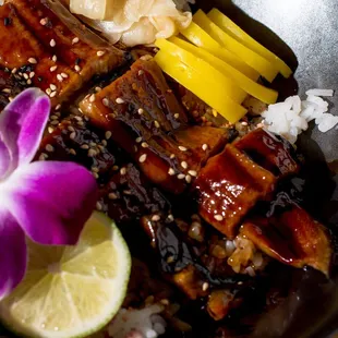Unagi Bowl - Grilled eel, oshinko, over rice and topped with eel sauce