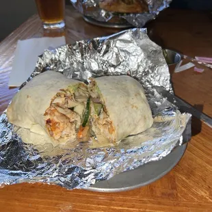 Ka-Pow Thai-style) warm tortilla surrounding: Chicken, Cucumbers, Cabbage, Onions, Avocado, Peanut Butter, Chili Garlic Sauce