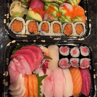 two trays of sushi