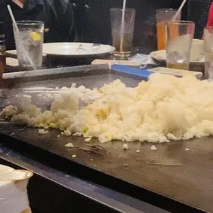 Mound of rice being fried with egg