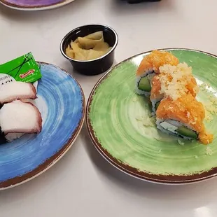 a variety of sushi on plates
