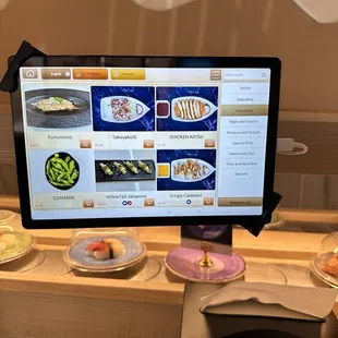 iPad menu ranging from drinks, appetizers, ramen and more!