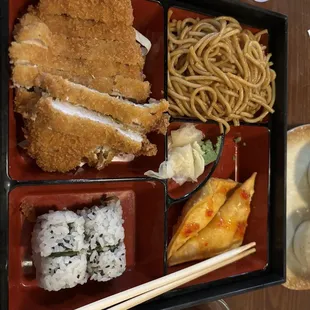 Pork Bento box. Over cooked with old oil.