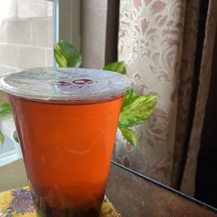 Pomegranate green tea with boba