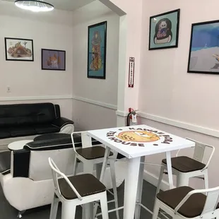 Lounge area and table with high chairs