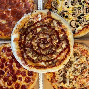 a variety of pizzas