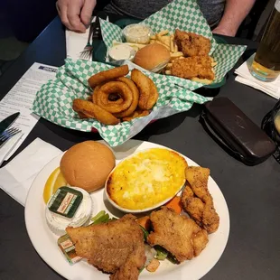Fish and chips, mine with Mac N Cheese, sharing a nice order if tasty Onion Rings :p