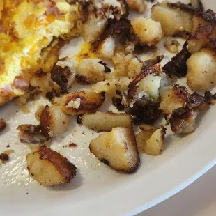 That's all the home fries they gave me. Also they were bland and burnt.