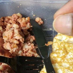 Long piece of hair from the hash, crossing the knife, to my finger tip.