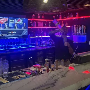 Payton working the bar