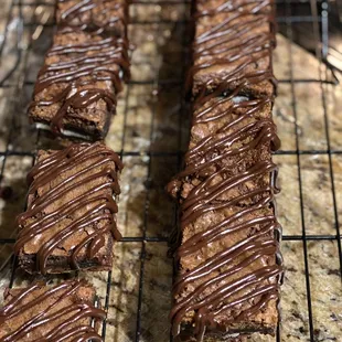 chocolate covered cookies on a cooling rack
