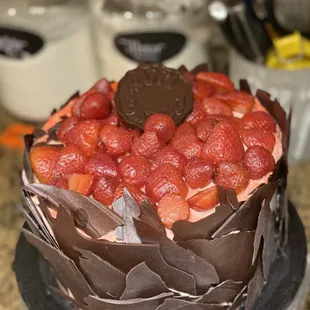 a chocolate covered strawberry cake