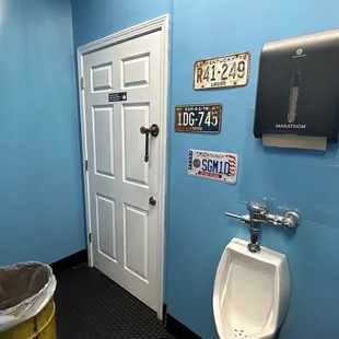 Men's bathroom... check out the door handle.