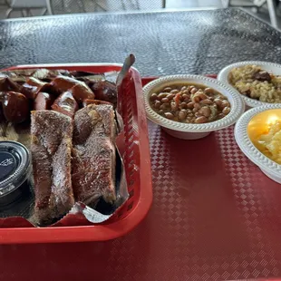 2 way meats Hot links and ribs Sides: beans, rice, and mac&amp;cheese
