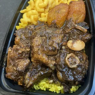 Ox tales Mac sweet plantains yellow rice