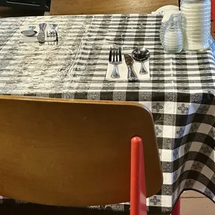 Each table is preset with napkins and silverware. It's a nice touch.