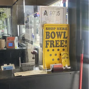  a bowl free sign in the window