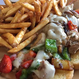 Carnitas sandwich. Fries were too greasy and battered for me. Bread soggy. Pork good though.