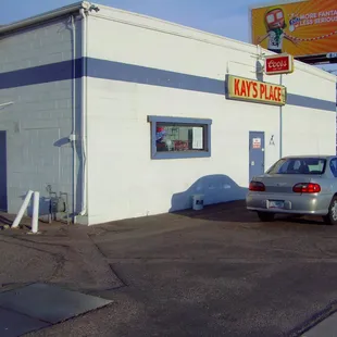 a car parked in front of a building